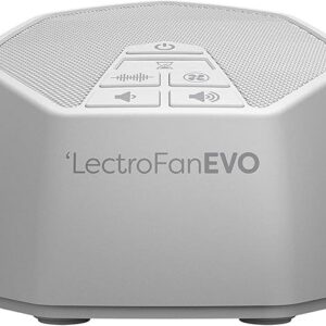 White LectroFan Evo device on a bedside table, with simple control buttons visible on its top surface.